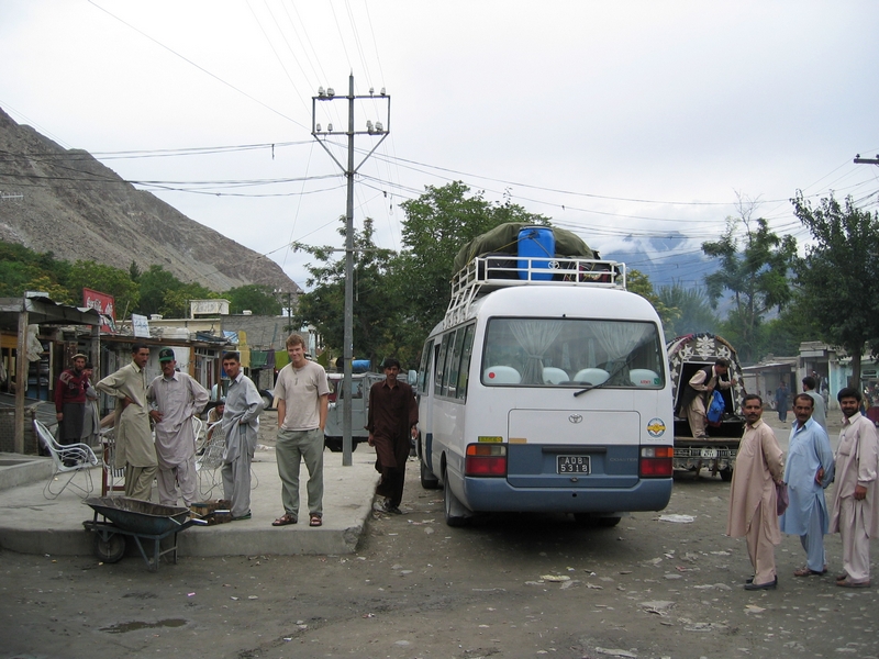 A stop on the Karakoram Highway: Hans next to our bus